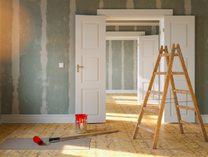 ladder in a half painted room