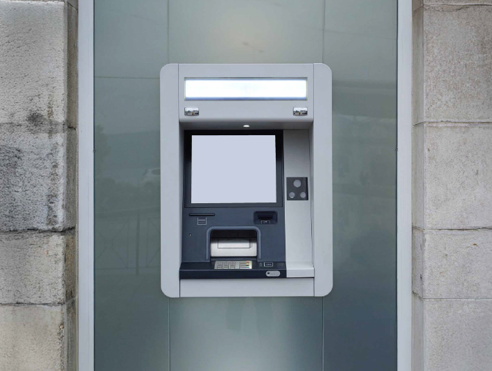 image of an atm in a wall